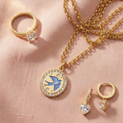 Homeward Swallow Necklace with the matching ring