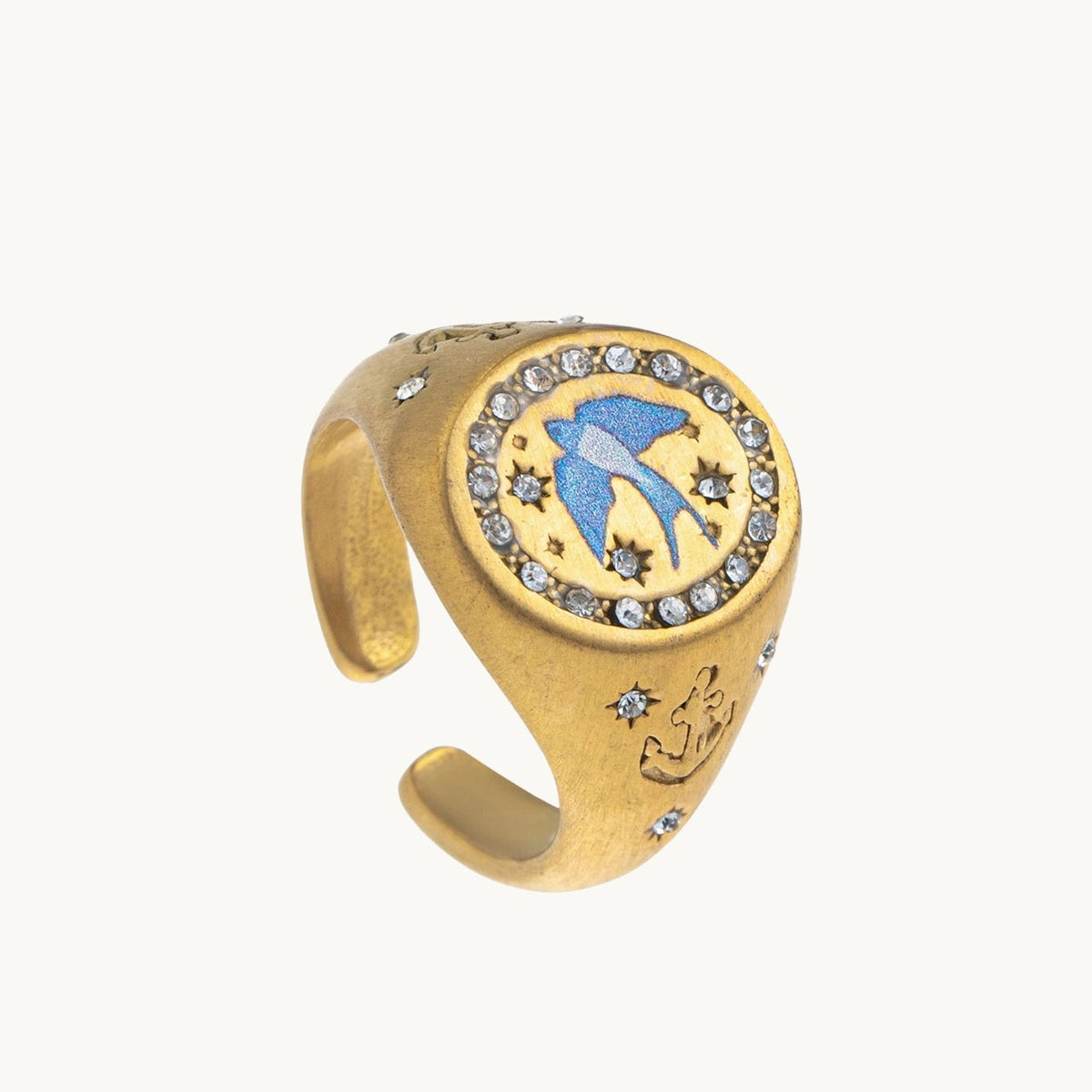 Homeward Swallow Ring, a gold-tone signet ring with a blue enamel swallow