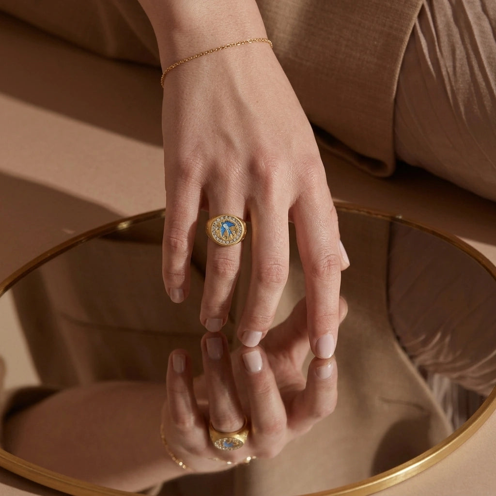 Homeward Swallow Ring worn on the hand