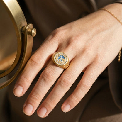 Homeward Swallow Ring worn on the hand, close-up