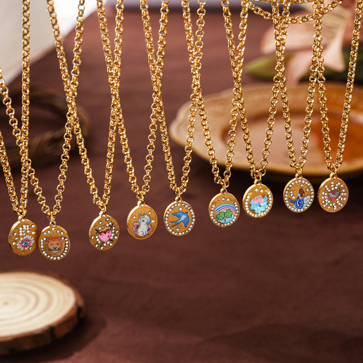 Pendant necklaces on brown fabric