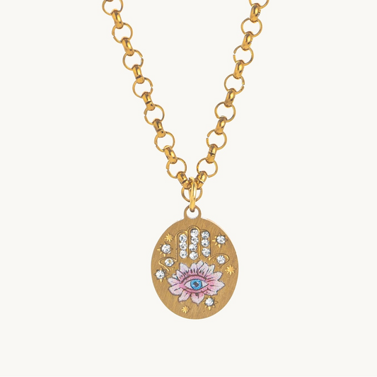 Hamsa Eye Necklace, an oval gold-tone pendant with an enamel hamsa hand and evil eye