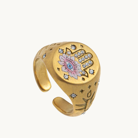 Hamsa Eye Ring, a gold-tone signet ring with an enamel hamsa hand and evil eye