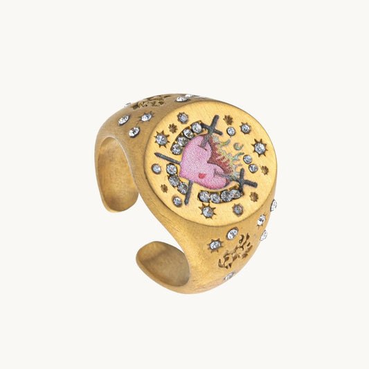 Sacred Heart Ring, a gold-tone signet ring with a flaming enamel sacred heart inside a halo of small stones